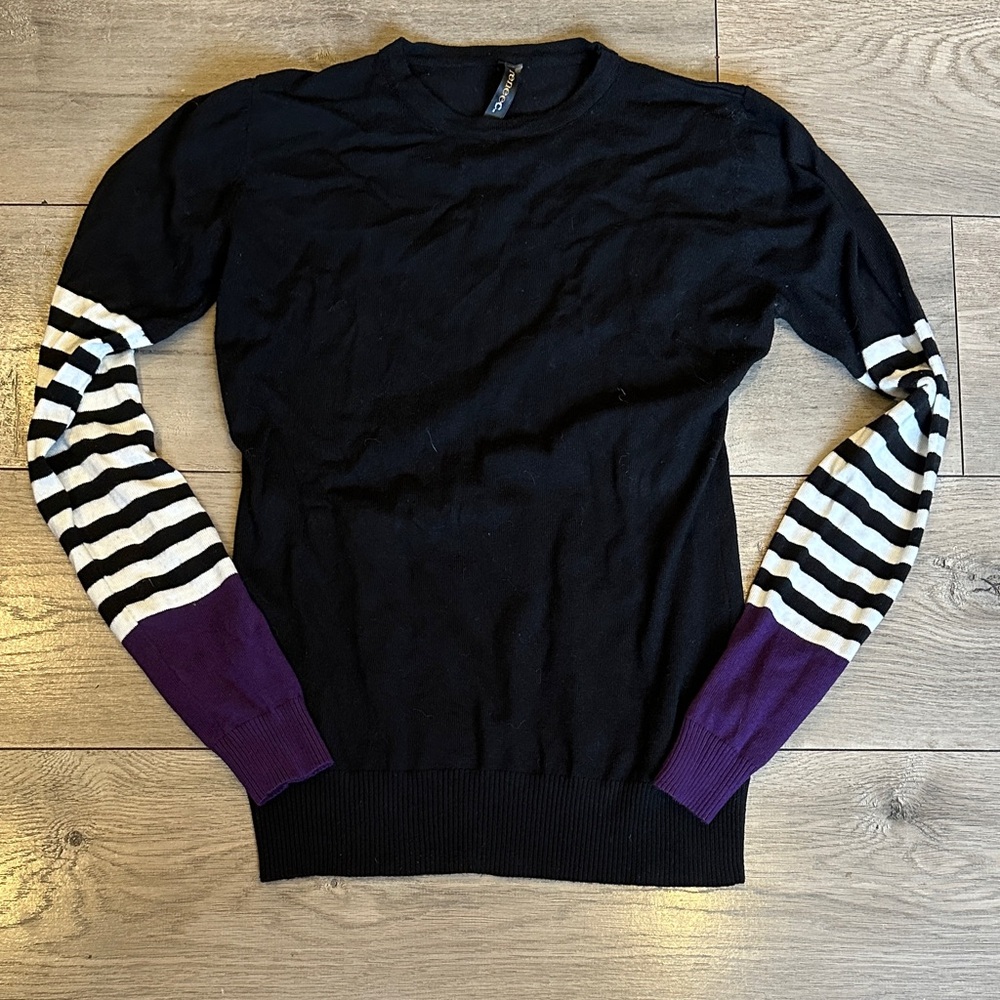 Funky Black Crewneck Sweater with Striped Sleeves and Purple Cuffs